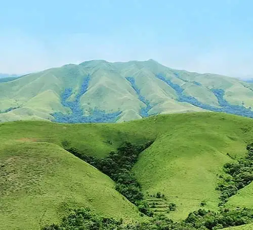 Kyathanamakki near Chikmagalur with green hills with several waterfalls & streams